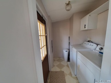 Enjoy lots of space in this newly updated home. Located in a on River Ridge Golf Club in Virginia - for sale on GolfHomes.com, golf home, golf lot