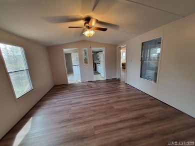 Enjoy lots of space in this newly updated home. Located in a on River Ridge Golf Club in Virginia - for sale on GolfHomes.com, golf home, golf lot