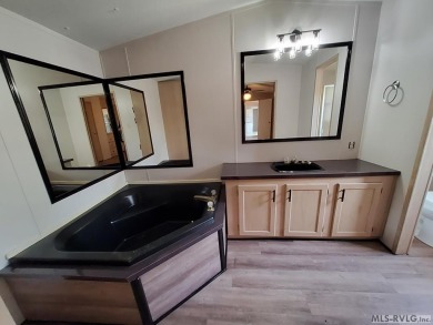 Enjoy lots of space in this newly updated home. Located in a on River Ridge Golf Club in Virginia - for sale on GolfHomes.com, golf home, golf lot