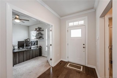 As you step inside, notice the LVP flooring  recessed lighting on Colonial Heritage Golf Club in Virginia - for sale on GolfHomes.com, golf home, golf lot