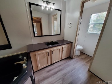 Enjoy lots of space in this newly updated home. Located in a on River Ridge Golf Club in Virginia - for sale on GolfHomes.com, golf home, golf lot