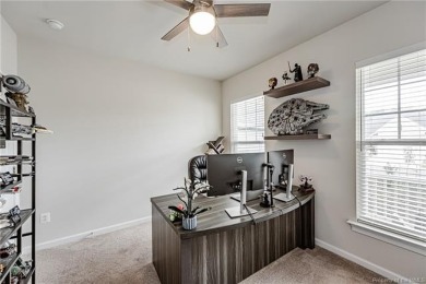 As you step inside, notice the LVP flooring  recessed lighting on Colonial Heritage Golf Club in Virginia - for sale on GolfHomes.com, golf home, golf lot