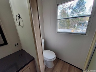 Enjoy lots of space in this newly updated home. Located in a on River Ridge Golf Club in Virginia - for sale on GolfHomes.com, golf home, golf lot