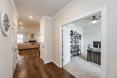 As you step inside, notice the LVP flooring  recessed lighting on Colonial Heritage Golf Club in Virginia - for sale on GolfHomes.com, golf home, golf lot