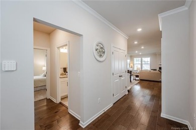As you step inside, notice the LVP flooring  recessed lighting on Colonial Heritage Golf Club in Virginia - for sale on GolfHomes.com, golf home, golf lot