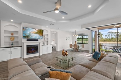 STUNNING 2-BEDROOM + DEN COACH HOME WITH BREATHTAKING WATER & on Esplanade Golf and  Country Club in Florida - for sale on GolfHomes.com, golf home, golf lot