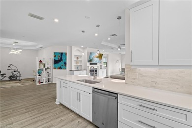 STUNNING 2-BEDROOM + DEN COACH HOME WITH BREATHTAKING WATER & on Esplanade Golf and  Country Club in Florida - for sale on GolfHomes.com, golf home, golf lot