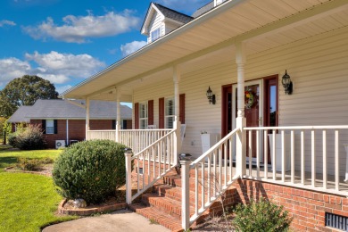 Welcome to this stunning 3-bedroom, 2.5-bathroom waterfront home on Players Course At Wyboo Plantation in South Carolina - for sale on GolfHomes.com, golf home, golf lot