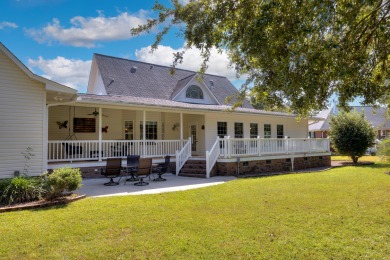 Welcome to this stunning 3-bedroom, 2.5-bathroom waterfront home on Players Course At Wyboo Plantation in South Carolina - for sale on GolfHomes.com, golf home, golf lot