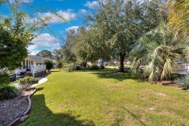Welcome to this stunning 3-bedroom, 2.5-bathroom waterfront home on Players Course At Wyboo Plantation in South Carolina - for sale on GolfHomes.com, golf home, golf lot
