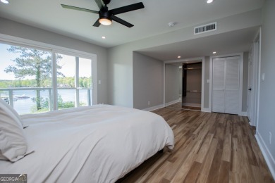 Lakefront Townhouse in a gated lake community with 24 hour on Fairfield Plantation Golf and Country Club in Georgia - for sale on GolfHomes.com, golf home, golf lot
