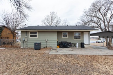 This beautifully maintained 5-bedroom, 2-bath home is as on Point Rock Golf Club in Kansas - for sale on GolfHomes.com, golf home, golf lot