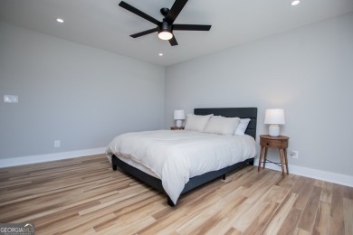 Lakefront Townhouse in a gated lake community with 24 hour on Fairfield Plantation Golf and Country Club in Georgia - for sale on GolfHomes.com, golf home, golf lot