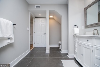 Lakefront Townhouse in a gated lake community with 24 hour on Fairfield Plantation Golf and Country Club in Georgia - for sale on GolfHomes.com, golf home, golf lot