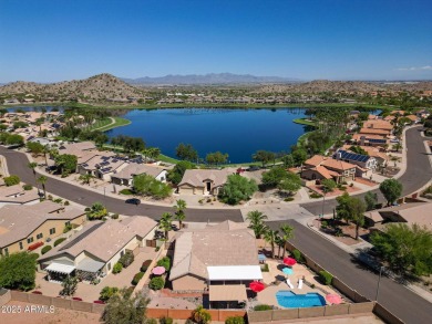 Live the lake community lifestyle in this spacious 4-bed home on on Estrella Mountain Ranch Golf Course in Arizona - for sale on GolfHomes.com, golf home, golf lot
