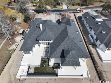Amazing single story plan being built directly on the waterway on Barefoot Resort and Golf Club - Fazio Course in South Carolina - for sale on GolfHomes.com, golf home, golf lot