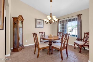 Live the lake community lifestyle in this spacious 4-bed home on on Estrella Mountain Ranch Golf Course in Arizona - for sale on GolfHomes.com, golf home, golf lot