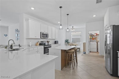 Set along a golf course with open views and no homes behind on Copperhead Golf Club in Florida - for sale on GolfHomes.com, golf home, golf lot