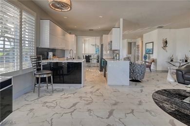 Rarely available and highly coveted end unit with 2-car garage on Gulf Harbour Yacht and Country Club in Florida - for sale on GolfHomes.com, golf home, golf lot