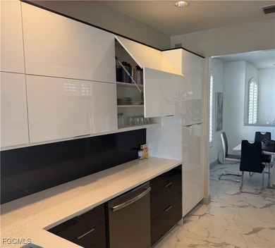 Rarely available and highly coveted end unit with 2-car garage on Gulf Harbour Yacht and Country Club in Florida - for sale on GolfHomes.com, golf home, golf lot