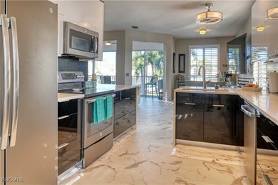 Rarely available and highly coveted end unit with 2-car garage on Gulf Harbour Yacht and Country Club in Florida - for sale on GolfHomes.com, golf home, golf lot