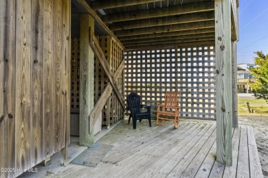 Your beach escape awaits in this gorgeous  2-bedroom, 2-bath on North Shore Country Club in North Carolina - for sale on GolfHomes.com, golf home, golf lot