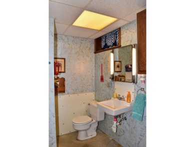 This 3 bedroom, 2 bathroom 1 1 2 story home near Floyd Golf on Floyd Park Golf Course in Iowa - for sale on GolfHomes.com, golf home, golf lot