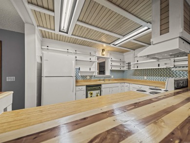 This Cooper-built 2bed-2bath renovation highlights the solid on Cortez Golf Course in Arkansas - for sale on GolfHomes.com, golf home, golf lot