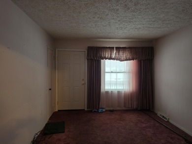 Located on a quiet street on Pontiac's South Side, this on The Links At Crystal Lake in Michigan - for sale on GolfHomes.com, golf home, golf lot