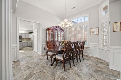 Elegant all-brick golf-front living with sweeping 9th-fairway on International Club of Myrtle Beach in South Carolina - for sale on GolfHomes.com, golf home, golf lot