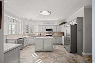 Elegant all-brick golf-front living with sweeping 9th-fairway on International Club of Myrtle Beach in South Carolina - for sale on GolfHomes.com, golf home, golf lot