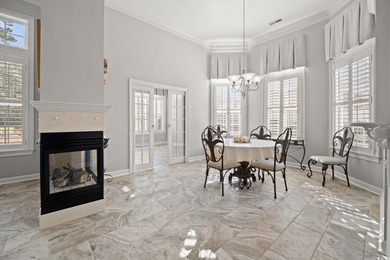 Elegant all-brick golf-front living with sweeping 9th-fairway on International Club of Myrtle Beach in South Carolina - for sale on GolfHomes.com, golf home, golf lot