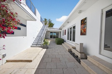 The owners are downsizing, creating a rare opportunity to own on Lake Worth Municipal Golf Course in Florida - for sale on GolfHomes.com, golf home, golf lot