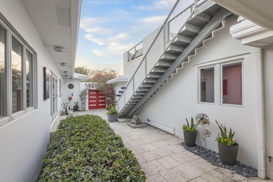 The owners are downsizing, creating a rare opportunity to own on Lake Worth Municipal Golf Course in Florida - for sale on GolfHomes.com, golf home, golf lot