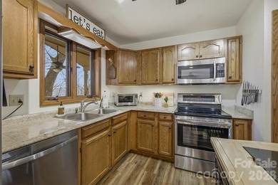 Escape to your own Blue Ridge retreat in the highly sought-after on Land Harbor Golf Course in North Carolina - for sale on GolfHomes.com, golf home, golf lot