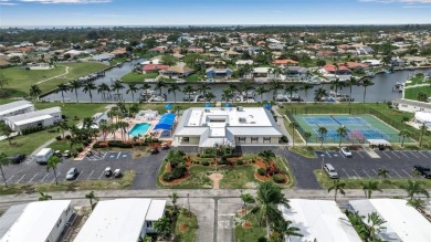 Bring your boat! This is an absolute MUST-SEE HOME! This on Boca Royale Golf and Country Club in Florida - for sale on GolfHomes.com, golf home, golf lot