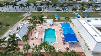 Bring your boat! This is an absolute MUST-SEE HOME! This on Boca Royale Golf and Country Club in Florida - for sale on GolfHomes.com, golf home, golf lot