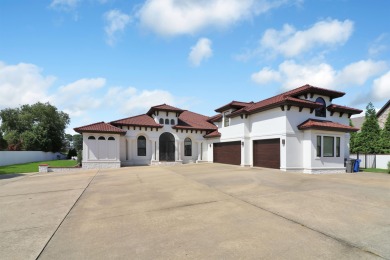 Mediterranean style home with golf course view.  4 beds/4 baths on RidgePointe Country Club in Arkansas - for sale on GolfHomes.com, golf home, golf lot