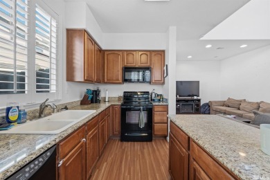 This charming townhome in the Villas at Sky Vista is an on Sierra Sage Golf Course in Nevada - for sale on GolfHomes.com, golf home, golf lot