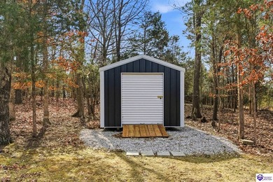 Welcome to 87 Glenn Eagle Road in the beautiful Doe Valley on Doe Valley Country Club in Kentucky - for sale on GolfHomes.com, golf home, golf lot