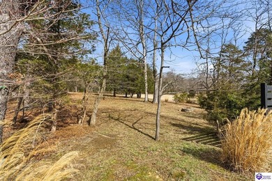 Welcome to 87 Glenn Eagle Road in the beautiful Doe Valley on Doe Valley Country Club in Kentucky - for sale on GolfHomes.com, golf home, golf lot