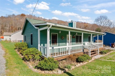 Soak up the mountains in this move-in ready home. With easy on Maggie Valley Resort and Country Club in North Carolina - for sale on GolfHomes.com, golf home, golf lot