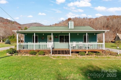 Soak up the mountains in this move-in ready home. With easy on Maggie Valley Resort and Country Club in North Carolina - for sale on GolfHomes.com, golf home, golf lot
