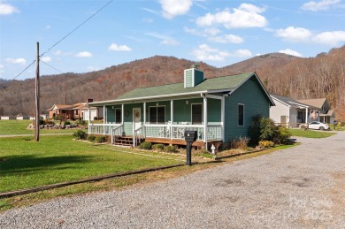 Soak up the mountains in this move-in ready home. With easy on Maggie Valley Resort and Country Club in North Carolina - for sale on GolfHomes.com, golf home, golf lot