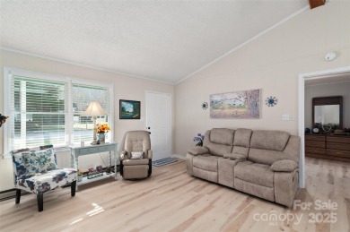 Soak up the mountains in this move-in ready home. With easy on Maggie Valley Resort and Country Club in North Carolina - for sale on GolfHomes.com, golf home, golf lot