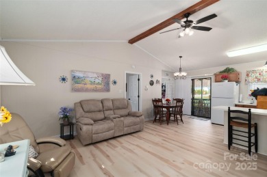 Soak up the mountains in this move-in ready home. With easy on Maggie Valley Resort and Country Club in North Carolina - for sale on GolfHomes.com, golf home, golf lot