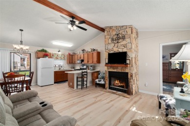 Soak up the mountains in this move-in ready home. With easy on Maggie Valley Resort and Country Club in North Carolina - for sale on GolfHomes.com, golf home, golf lot