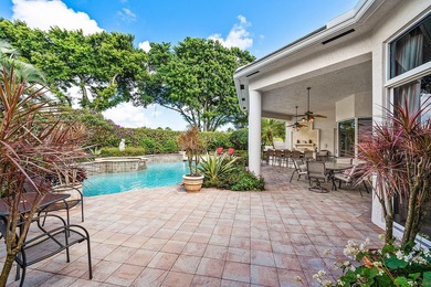 Exceptional single-story residence available in Ballenisles on BallenIsles Golf and Country Club in Florida - for sale on GolfHomes.com, golf home, golf lot