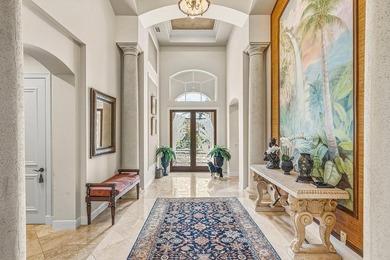 Exceptional single-story residence available in Ballenisles on BallenIsles Golf and Country Club in Florida - for sale on GolfHomes.com, golf home, golf lot