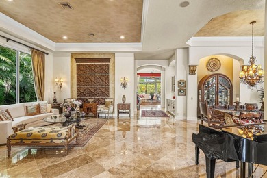 Exceptional single-story residence available in Ballenisles on BallenIsles Golf and Country Club in Florida - for sale on GolfHomes.com, golf home, golf lot